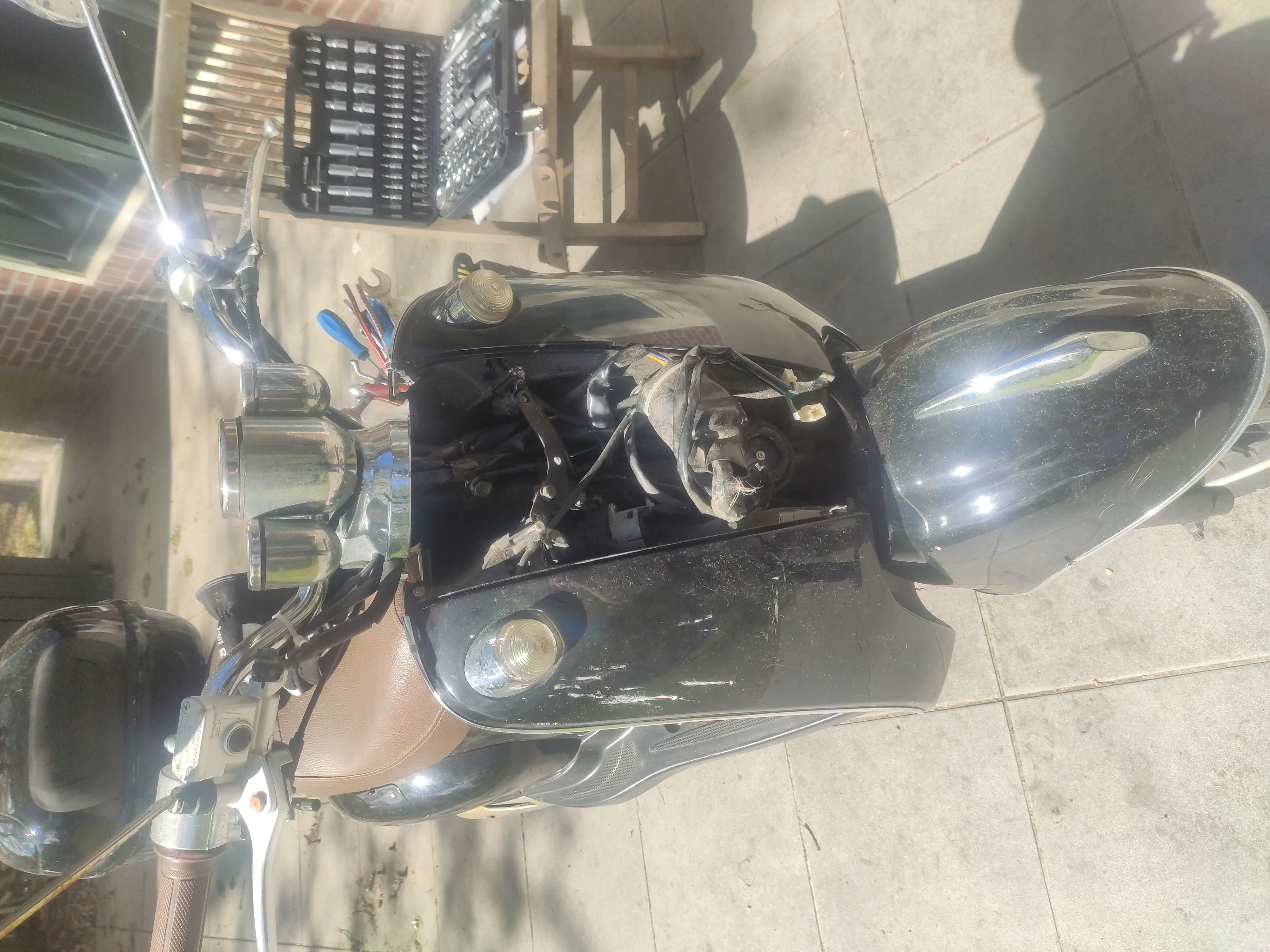 The open front of the scooter